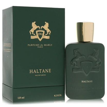Parfums de Marly Haltane Eau de Parfum bottle in dark green with a gold cap, shown next to its matching dark green box with gold lettering.